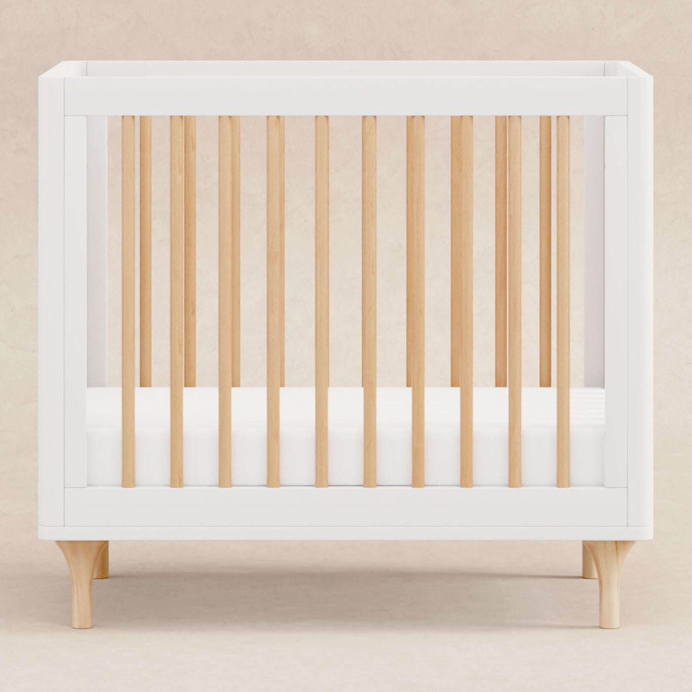 Lolly 4 in 1 Convertible Mini Crib and Twin Bed w/Toddler Bed Conversion Kit in White/Natural